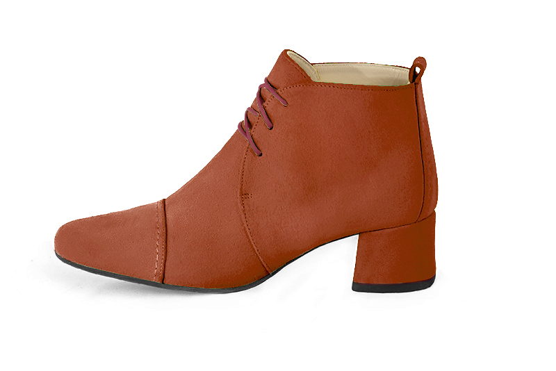 Terracotta orange women's ankle boots with laces at the front. Round toe. Low flare heels. Profile view - Florence KOOIJMAN